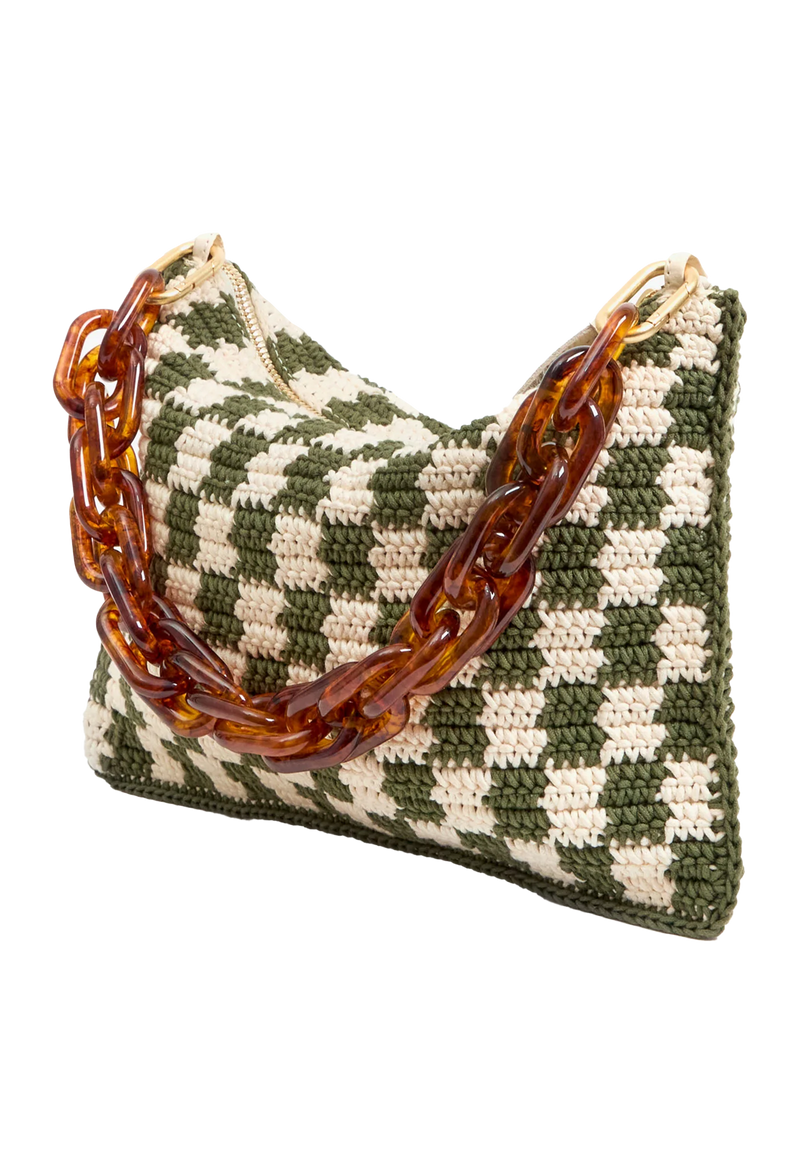 Green and white checkered clutch bag with brown chunky chain loop strap attached. Transparent background.