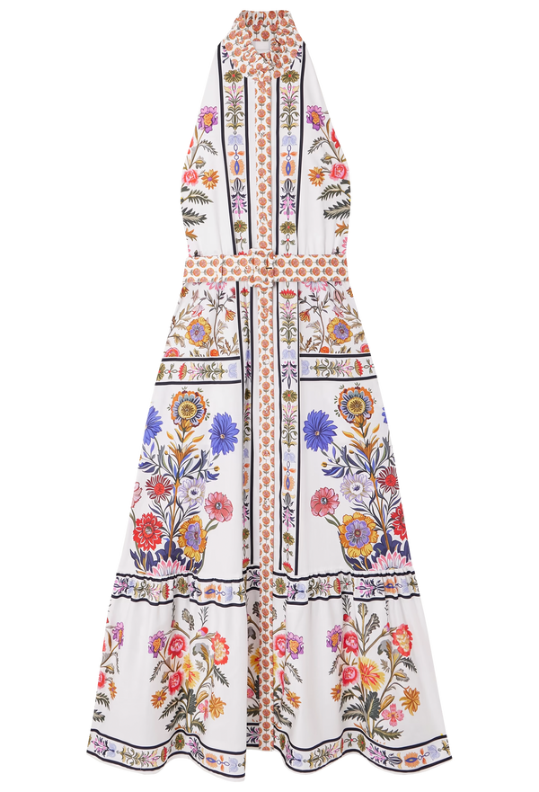 Long white flower printed halter dress. Set against a checkered background. 