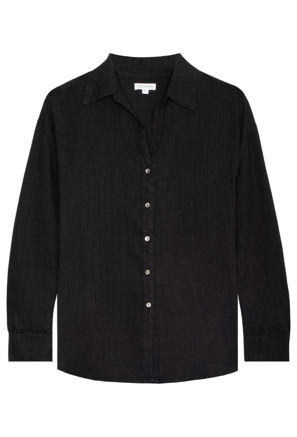 A FLATLAY OF A BLACK LONG SLEEVE LINEN SHIRT WITH A COLLAR AND SHELL BUTTONS UP THE FRONT. TRANSPARENT BACKGROUND. 
