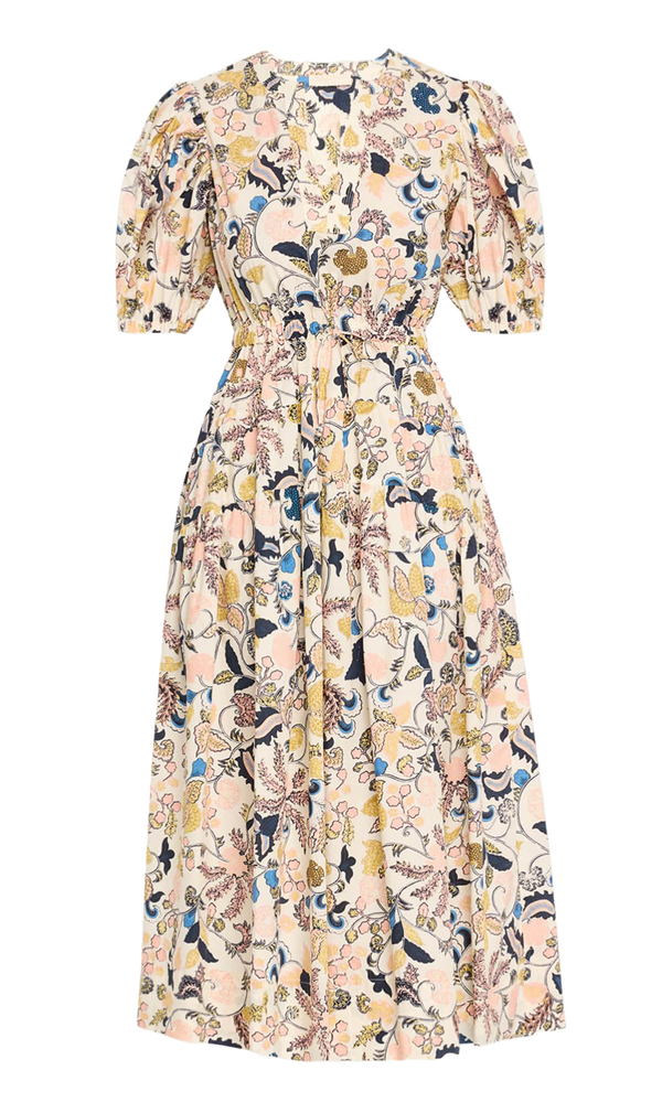 Flatlay of a floral dress with a cream base and blue, yellow, and pink floral motifs. The photo is taken on a transparent background. 