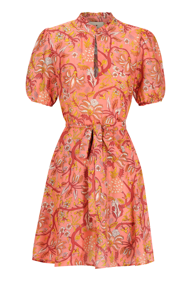 a coral mini dress with a tie waist, flared skirt, short puff sleeves, high neck with loop closure, and a yellow, red, and orange floral pattern. transparent background.