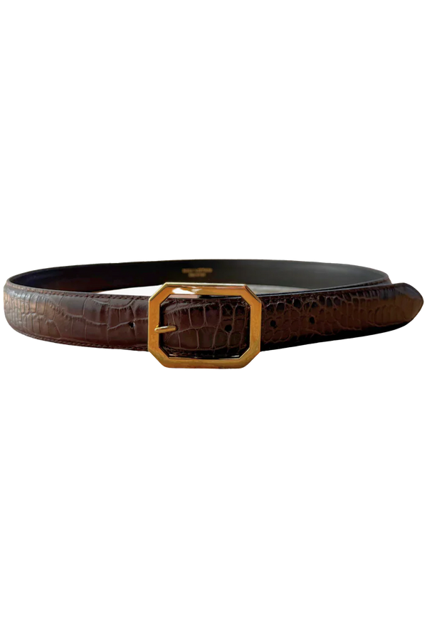 a croc detail brown belt with a gold octagonal buckle. transparent background.