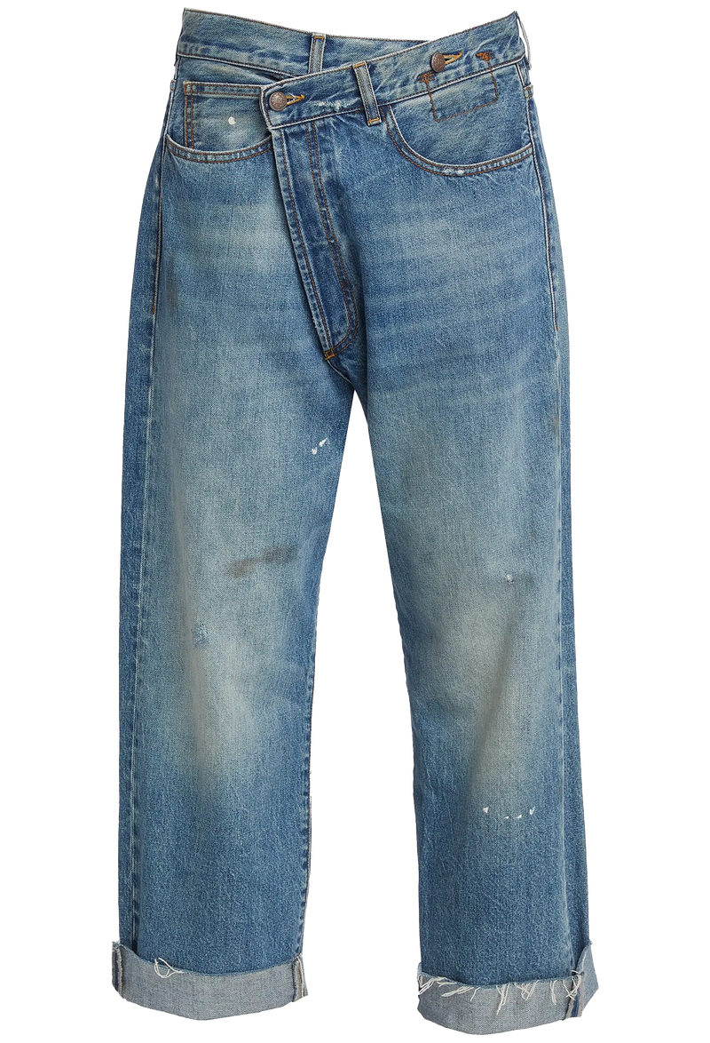 a pair of blue jeans cuffed at the hem with a crossover waistband style. transparent background