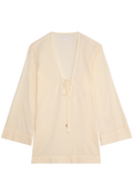 a light yellow deep v-neck mini coverup with long sleeves and a tie at the bust. transparent background.