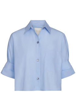 Light blue cropped button down shirt with rolled short sleeves on a transparent background