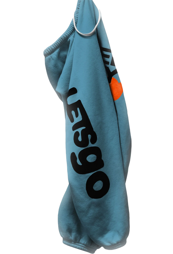 Blue sweatpants with 'LETSGO' text on a transparent background