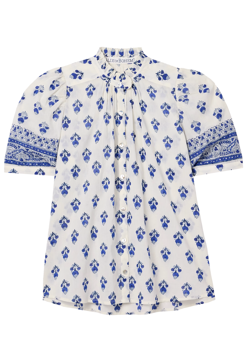 White blouse with blue floral pattern on a transparent background