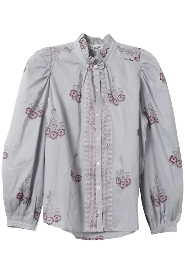 Light blue blouse with floral embroidery on a transparent background