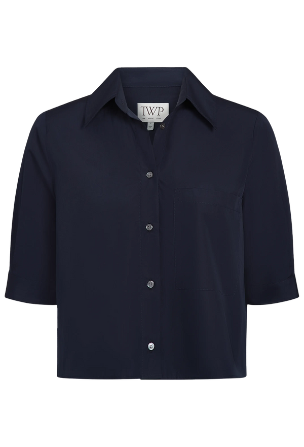 Navy blue cropped button up shirt with short sleeves on a transparent background