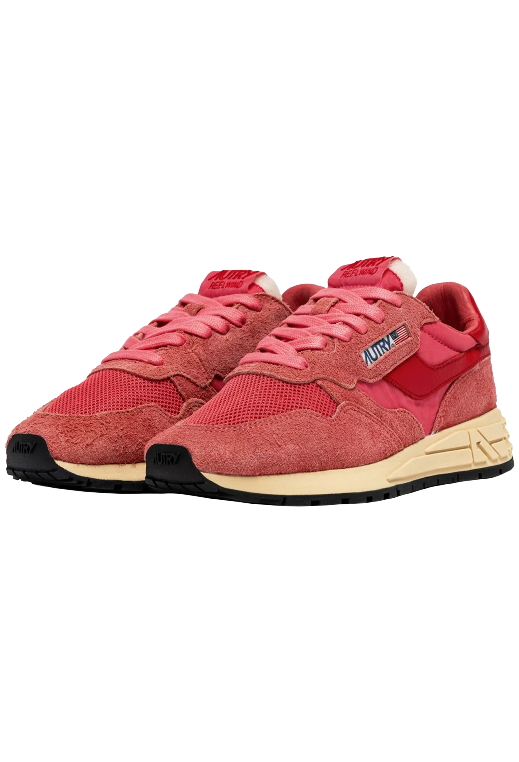 pink and red athletic tennis shoes with a black bottom