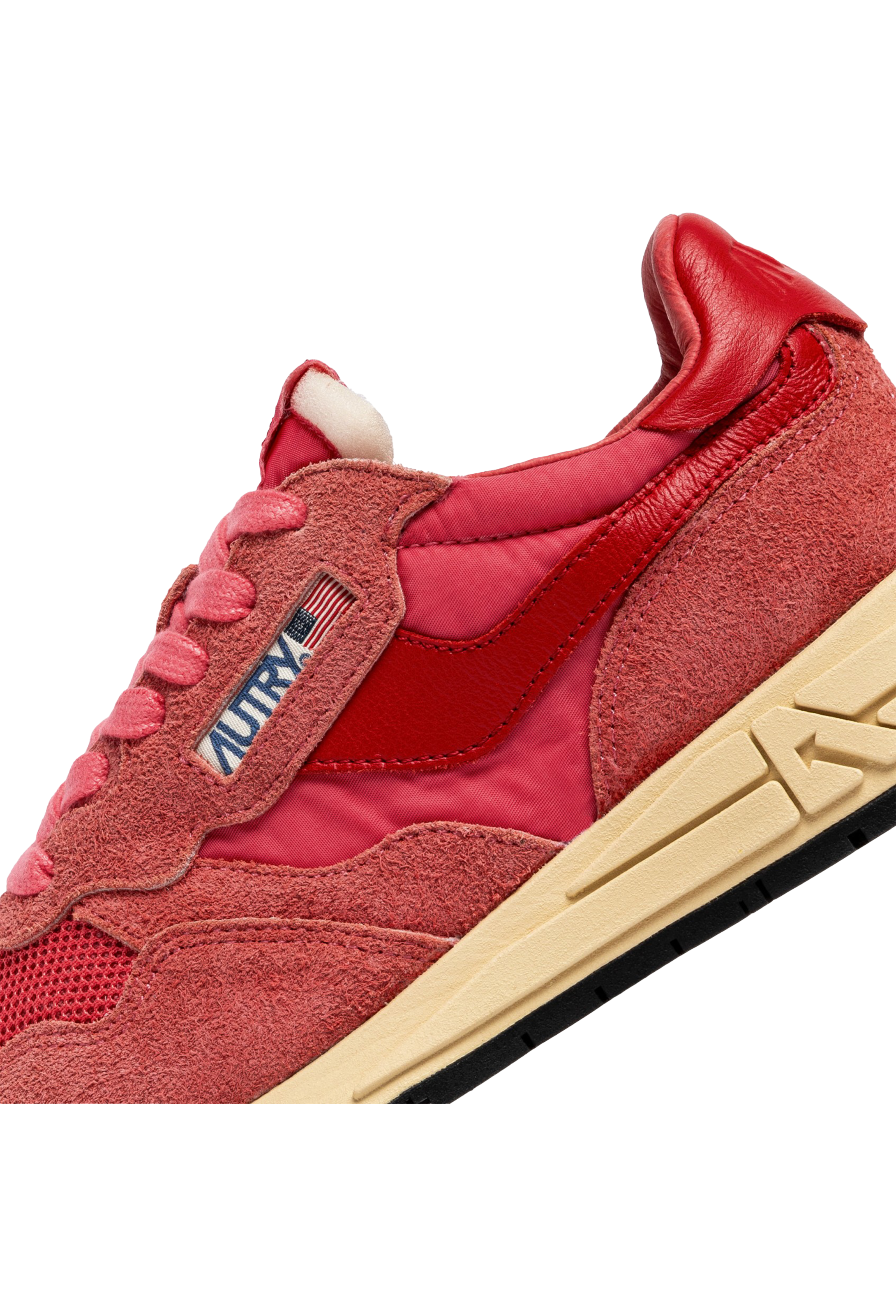 pink and red athletic tennis shoes with a black bottom