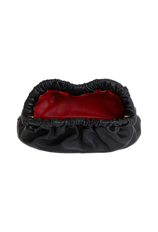 a black leather clutch bag with a red interior. transparent background.