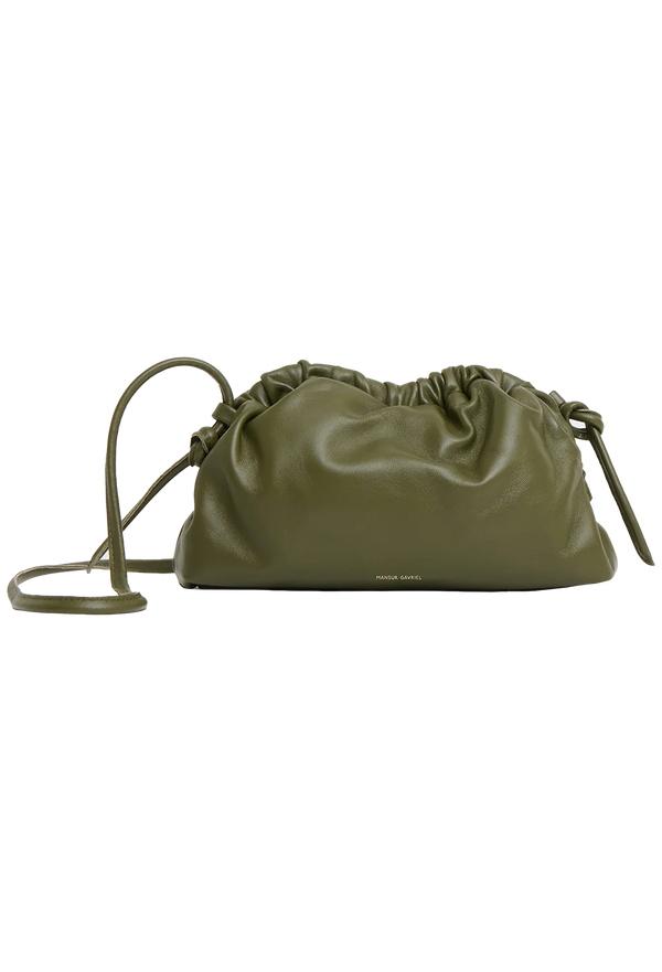 a green leather clutch bag. transparent background.