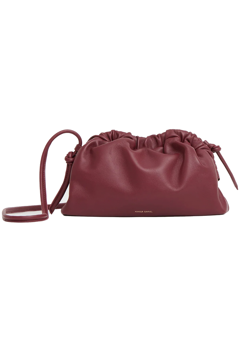 a red leather clutch bag. transparent background.