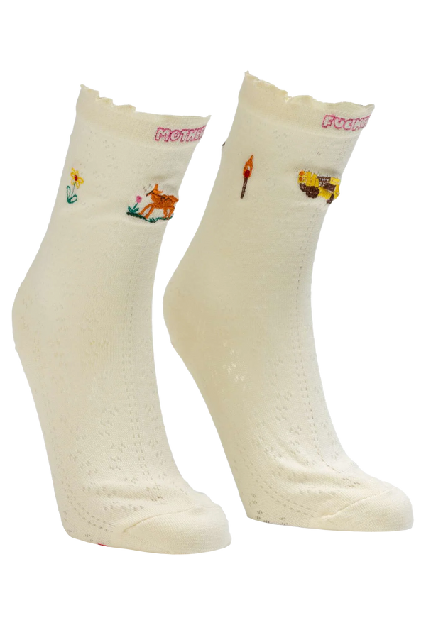 Pair of cream socks with colorful embroidered designs on a white background