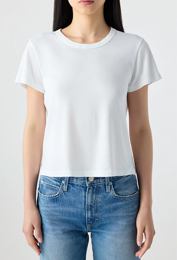 Person wearing a white t-shirt and blue jeans on a white background