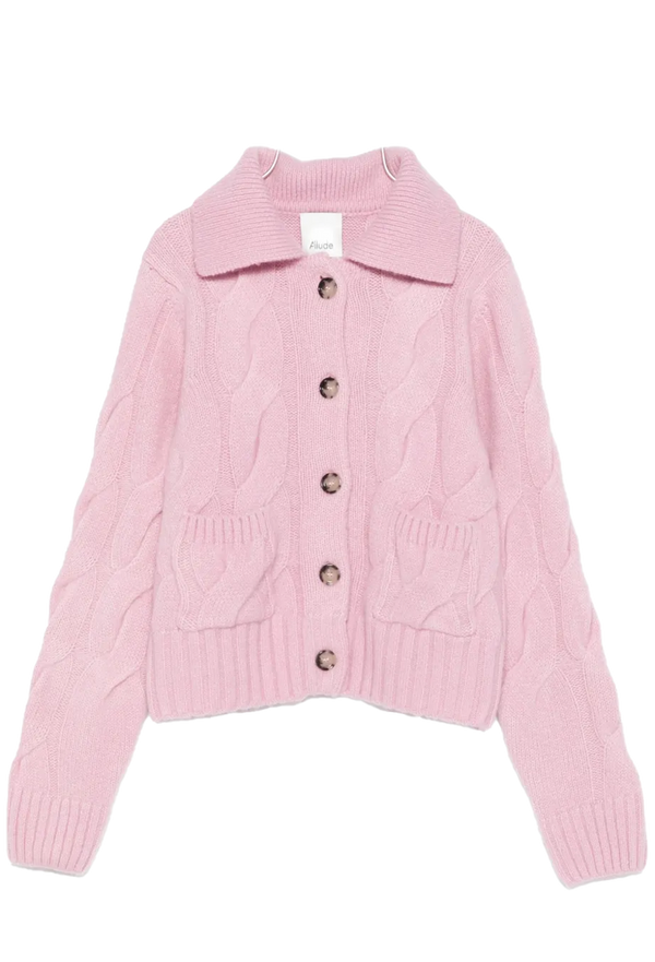 Pink knitted cardigan with buttons on a white background