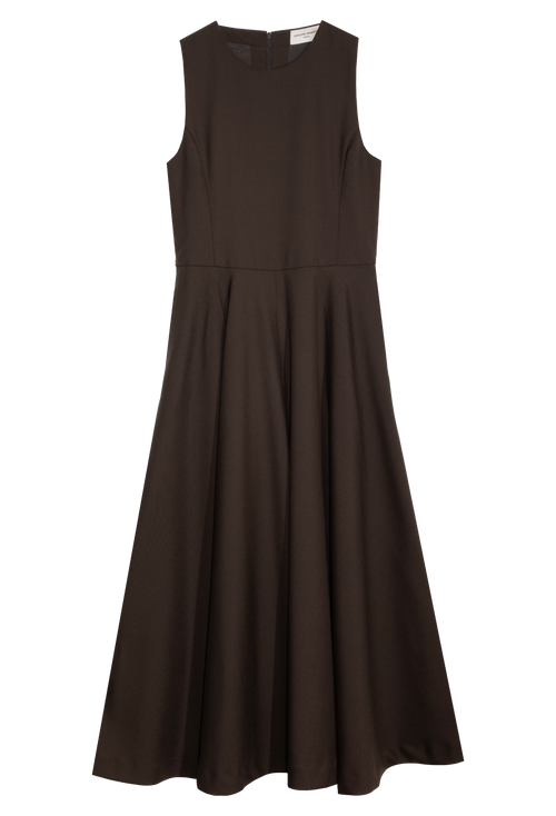 Long sleeveless brown dress set against a checkered background. 