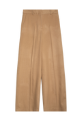 Tan high waisted wool trousers with belt loops. Set against a checkered background. 