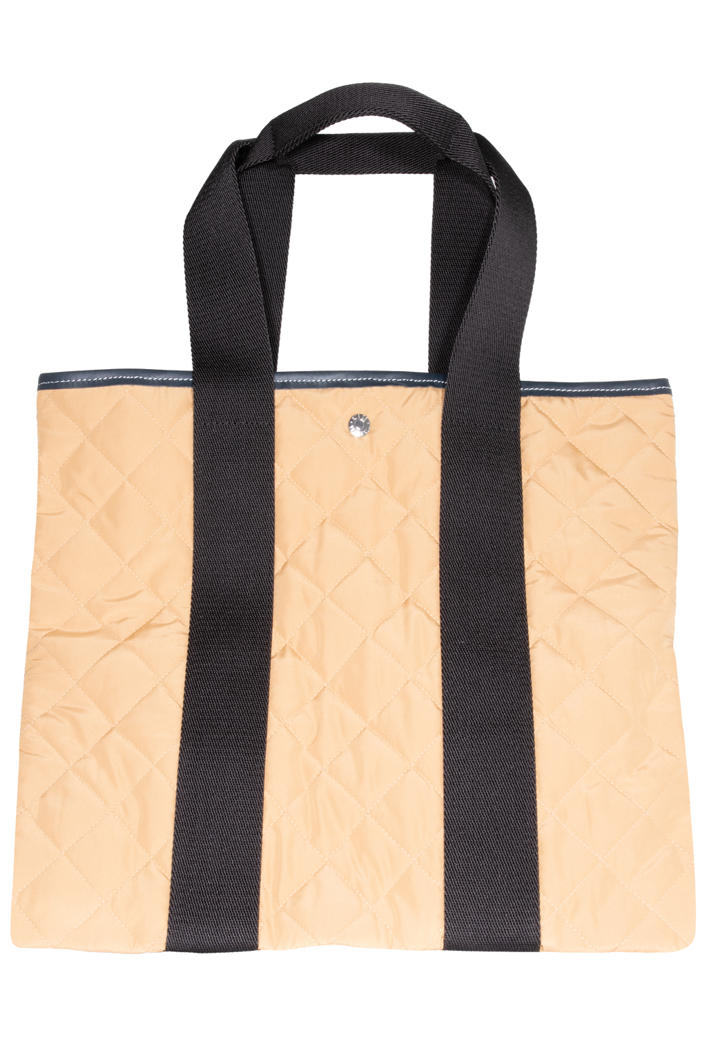 Tan quilted tote bag with two black straps, set against a checkered background. 