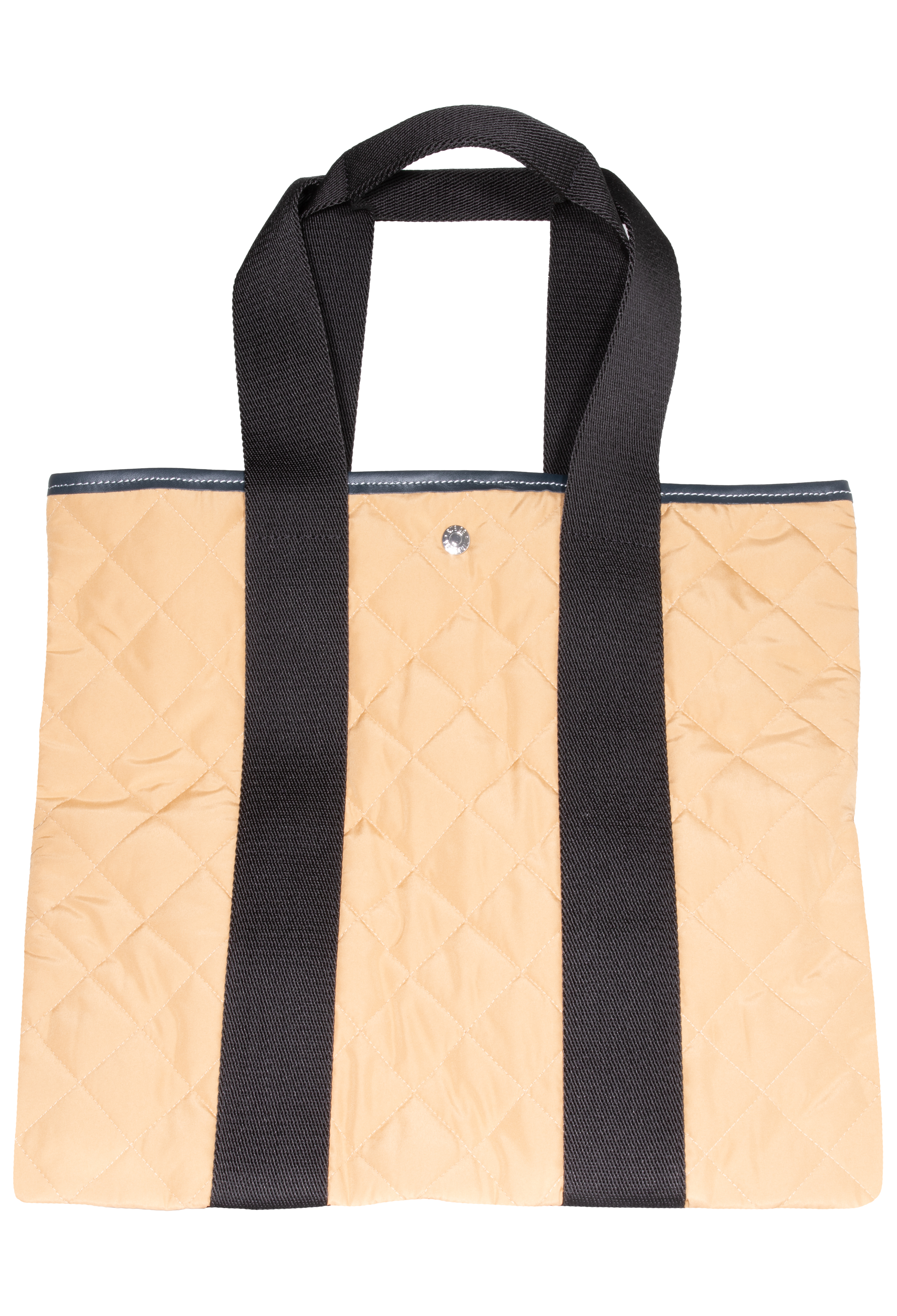 Tan quilted tote bag with two black straps, set against a checkered background. 