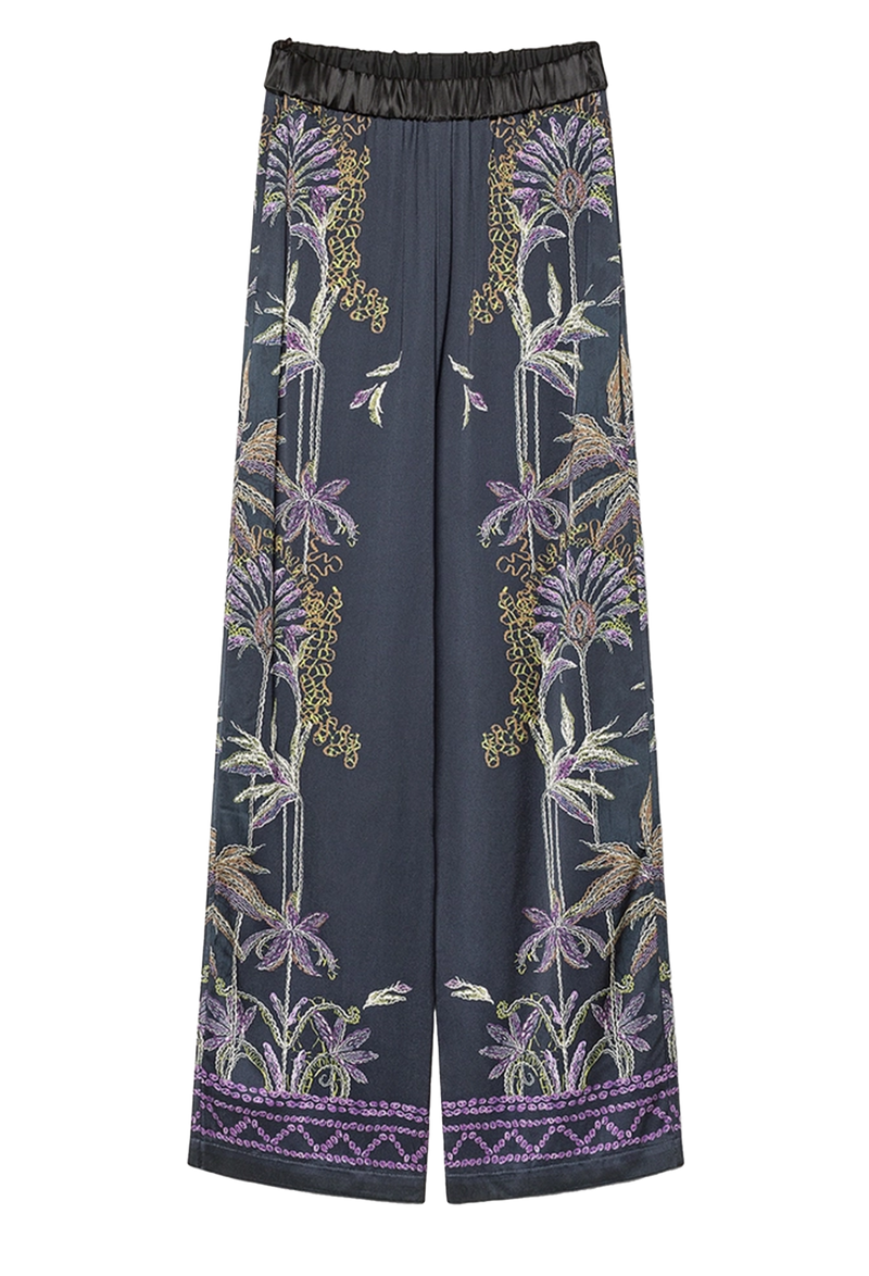 Navy pants with floral pattern on a white background