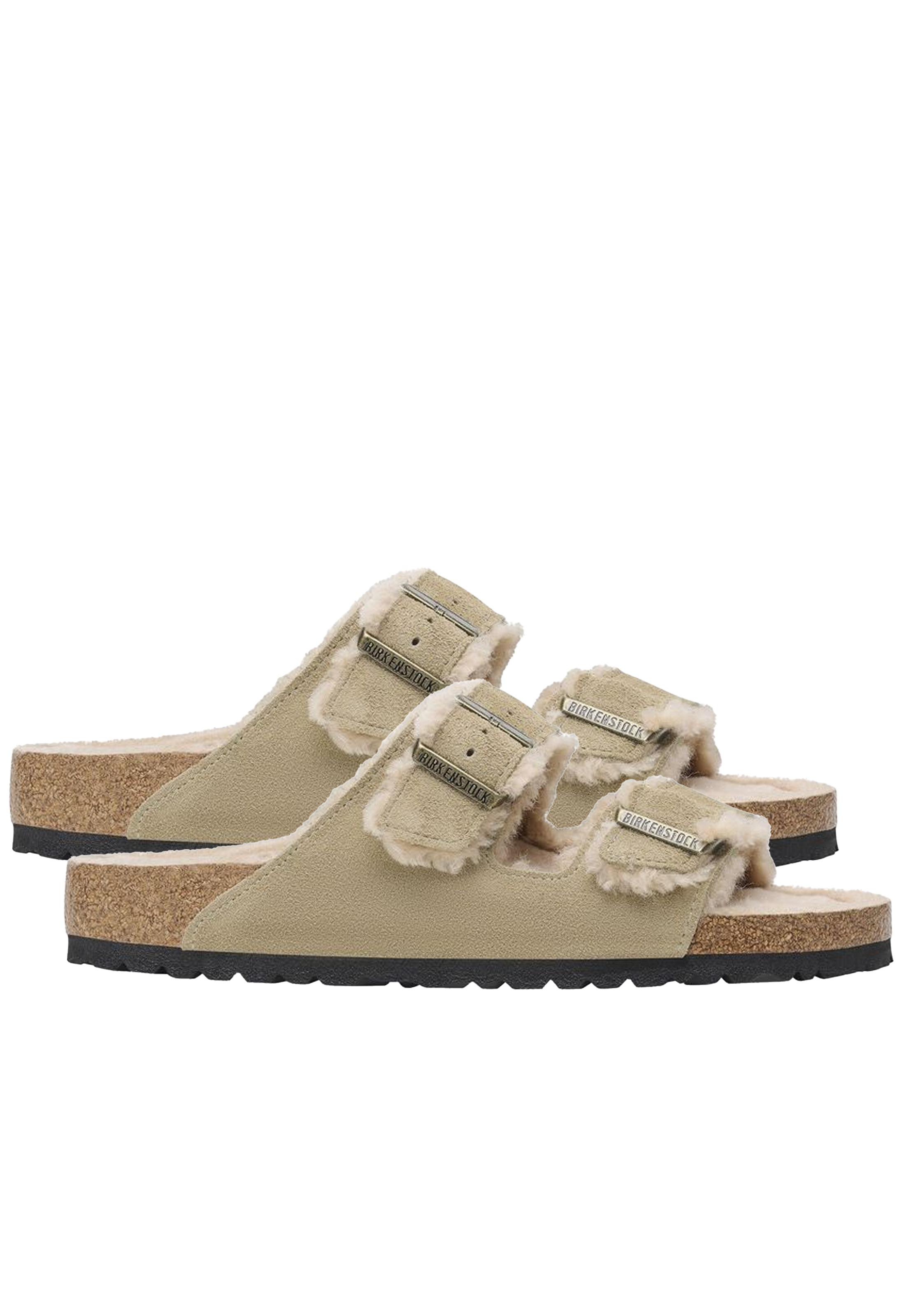Pair of beige double strap sandals with shearling inside and gold buckles. Set against a checkered background. 