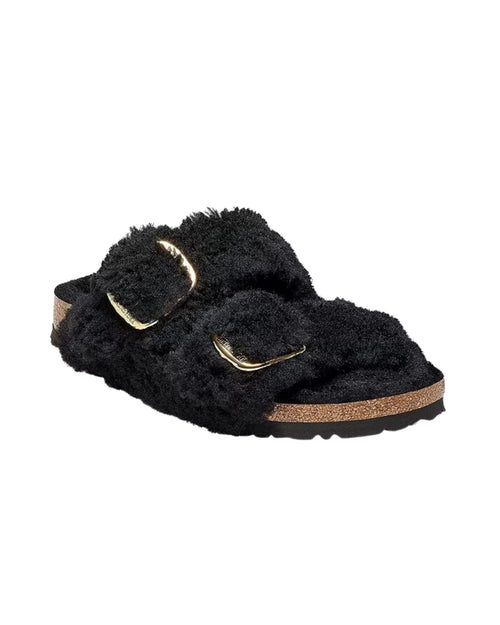 Fluffy teddy shearling sandal with two-strap design with oversized gold metal pin buckles and contoured cork-latex footbed.