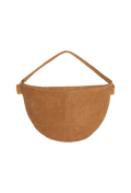 Tan leather purse set against a checkered background.