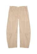 Wide leg khaki cargo pant with large pockets set against a checkered background.